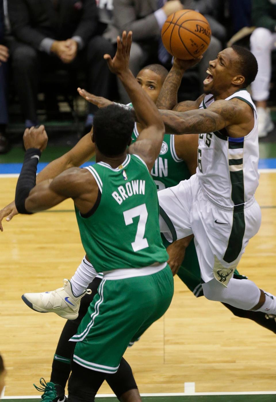 Milwaukee Bucks guard Eric Bledsoe (6) threads his way through Boston Celtics defenders during the first half of their playoff game  Thursday, April 26, 2018 at the BMO Harris Bradley Center in Milwaukee, Wis.MARK HOFFMAN/MILWAUKEE JOURNAL SENTINEL