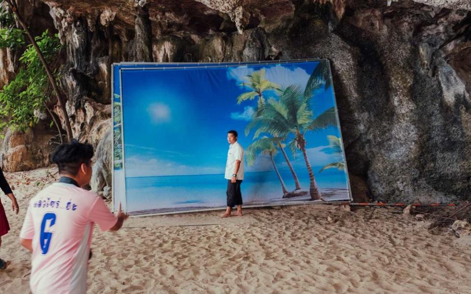 A man poses in front of a backdrop at Railay Beach, Krabi. | Stan Nalewski