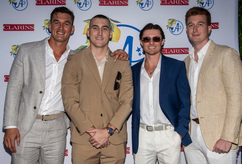 (Left to Right) Tyler Cameron, Ryan Cameron, Dante Cousart and Austin Cameron attend the annual red-carpet gala at The Pelican Club in Jupiter on Oct. 23 to benefit the foundation named for his mother.