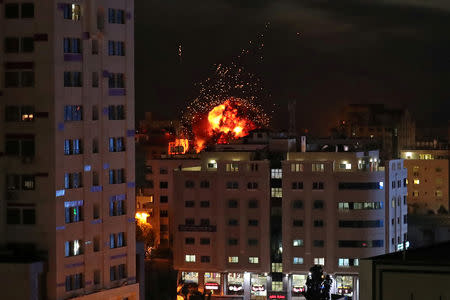 A ball of fire is seen during an Israeli air strike in Gaza City May 4, 2019. REUTERS/Suhaib Salem