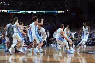 <p>Theo Pinson #1 of the North Carolina Tar Heels celebrates with teammates after defeating the Gonzaga Bulldogs during the 2017 NCAA Men’s Final Four National Championship game at University of Phoenix Stadium on April 3, 2017 in Glendale, Arizona. The Tar Heels defeated the Bulldogs 71-65. (Photo by Tom Pennington/Getty Images) </p>