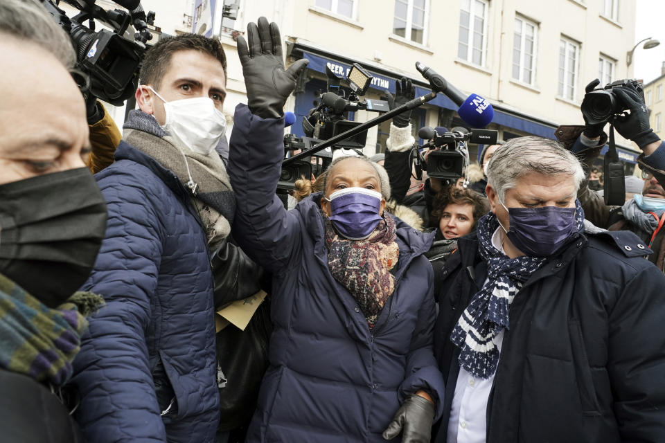 Former left-wing socialist minister Christiane Taubira waves the crowd after delivering a speech to announce that she is candidate for the French presidential election 2022 during a visit in Lyon, central France, Saturday, Jan. 15, 2022. (AP Photo/Laurent Cipriani)