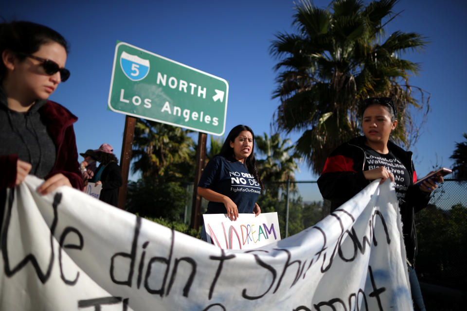 DACA recipient Barbara Hernandez (C), 26, participates in a protest for a clean Dream Act, in Anaheim, California, U.S., January 22, 2018. REUTERS/Lucy Nicholson