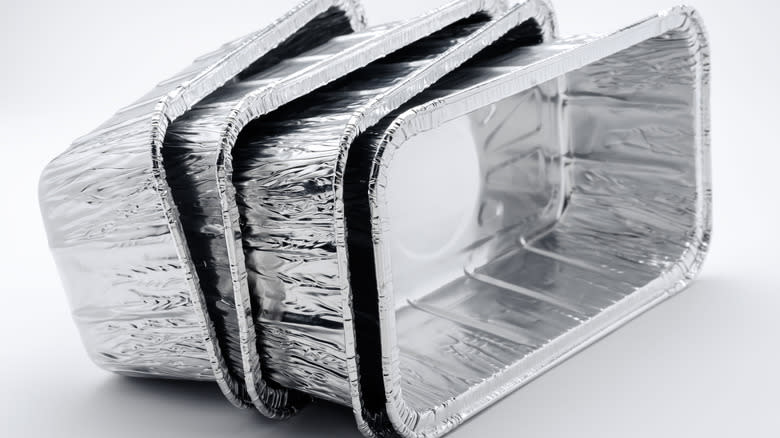 stacked aluminum food tins