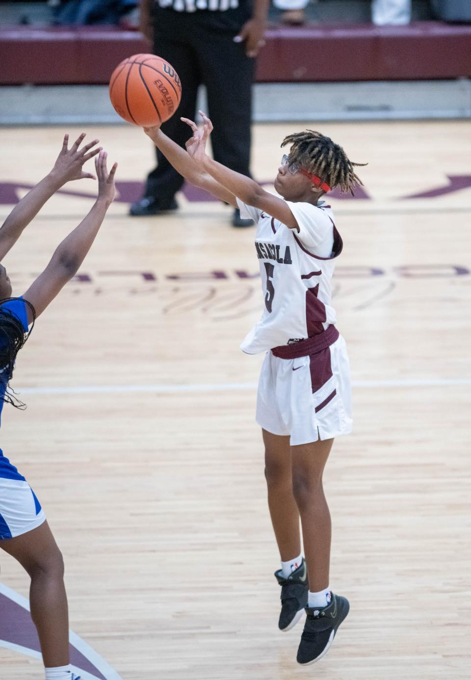 Jada Richardson (5) shoots during the Booker T. Washington vs Pensacola girls basketball game at Pensacola High School on Friday, Jan. 20, 2023.