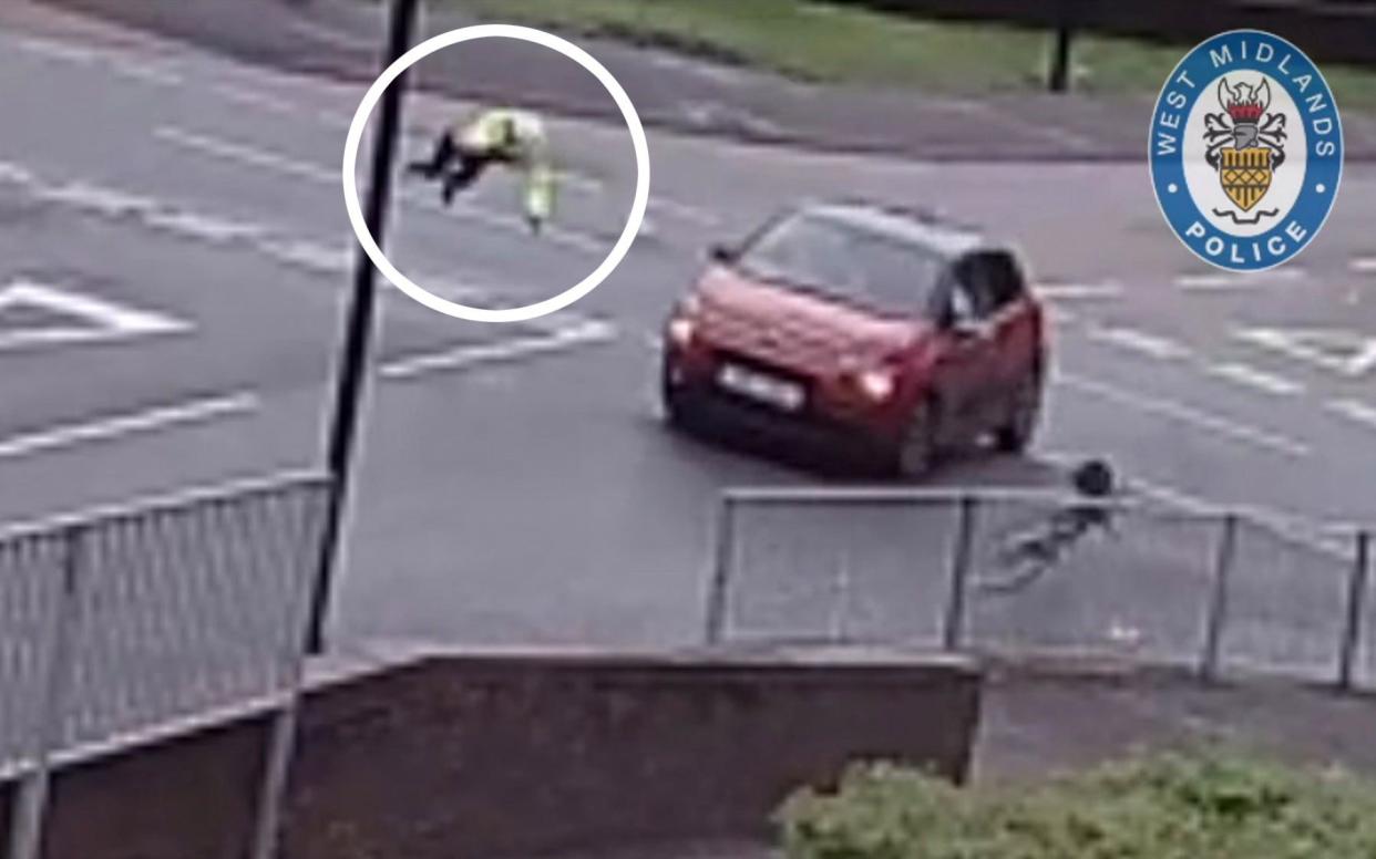 CCTV footage captured the moment the woman is sent into the air before crashing to the ground