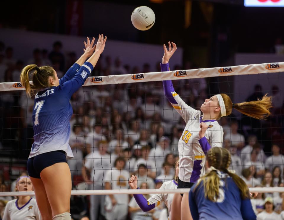 Taylorville's Mazie Fleming, right, pushes the ball over Nazareth Academy's Olivia Austin during their Class 3A volleyball state semifinal Friday, Nov. 11, 2022 at CEFCU Arena in Normal.