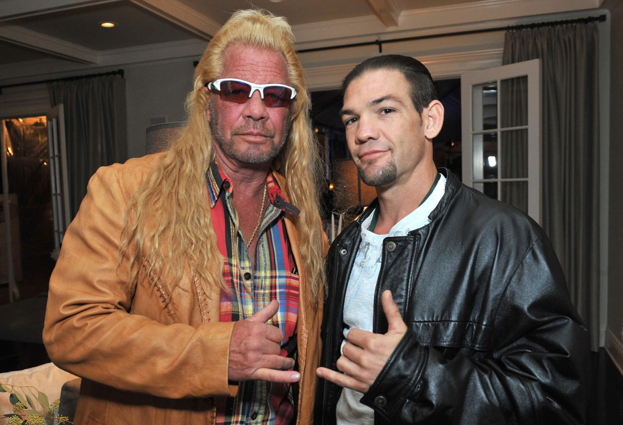 LOS ANGELES, CA - DECEMBER 12:  Dog Chapman and Leland Chapman attend the 2013 Electus & College Humor Holiday Party at a private residency on December 12, 2013 in Los Angeles, California.  (Photo by Angela Weiss/Getty Images for Electus)