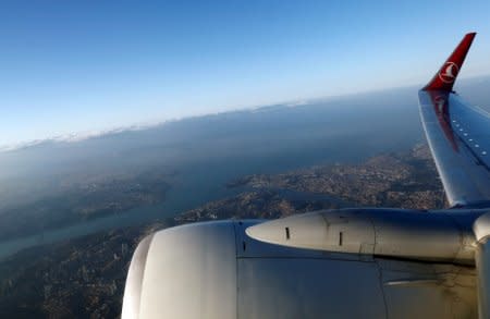 The Bosphorus strait and the Golden Horn are pictured through the window of a Turkish Airlines (THY) passenger aircraft over Istanbul, Turkey, July 20, 2017. REUTERS/Murad Sezer