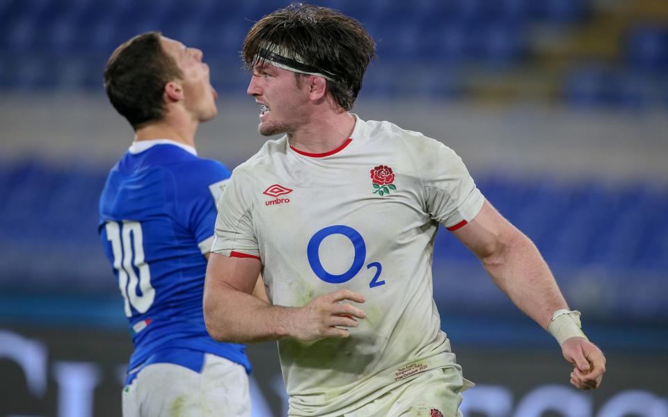 Tom Curry celebrates as England pull clear in the second half - GETTY IMAGES