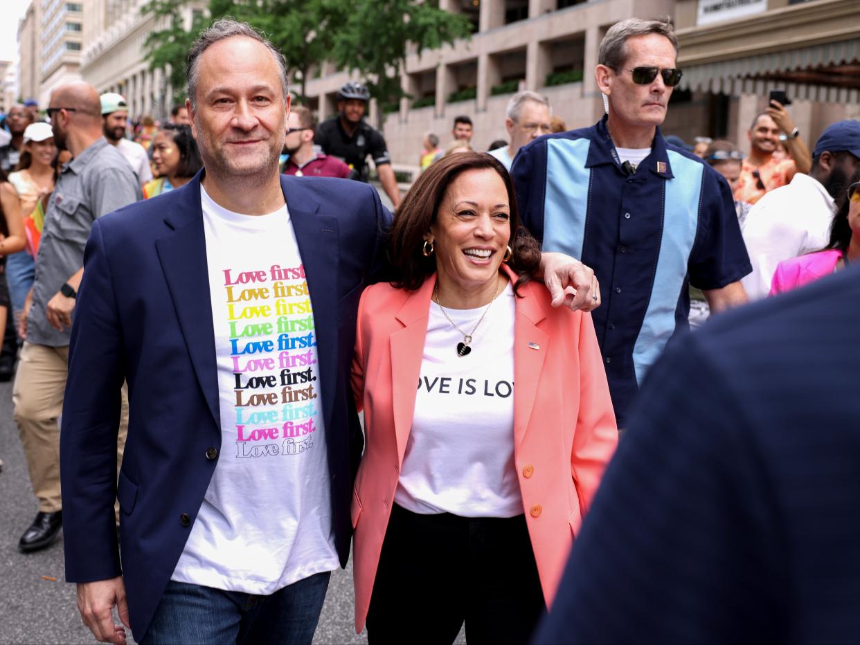 Kamala Harris and husband Doug Emhoff join marchers for the Capital Pride Parade in Washington DC, on Saturday (Getty)