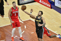 Memphis Grizzlies forward Kyle Anderson (1) shoots in the first half of an NBA basketball game against the New Orleans Pelicans, Monday, May 10, 2021, in Memphis, Tenn. (AP Photo/Brandon Dill)