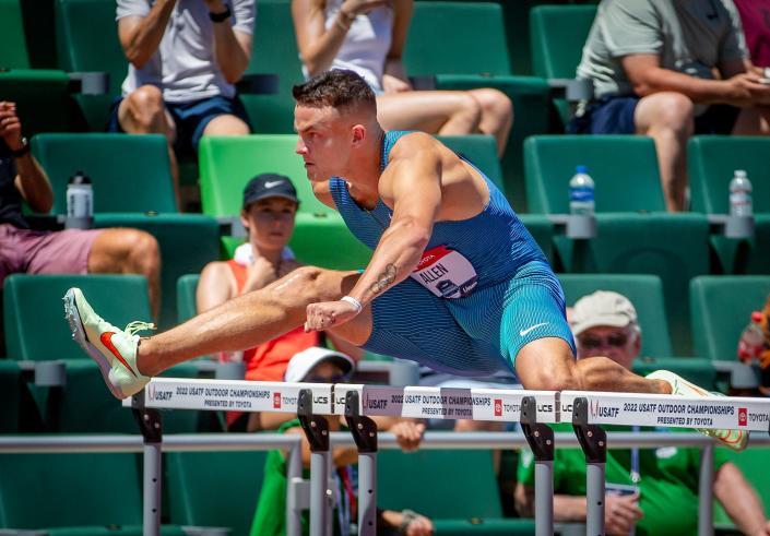 Devon Allen leaps over a hurdle in the first round of the men's 110 meter hurdles at the USA Track and Field Championships Saturday.