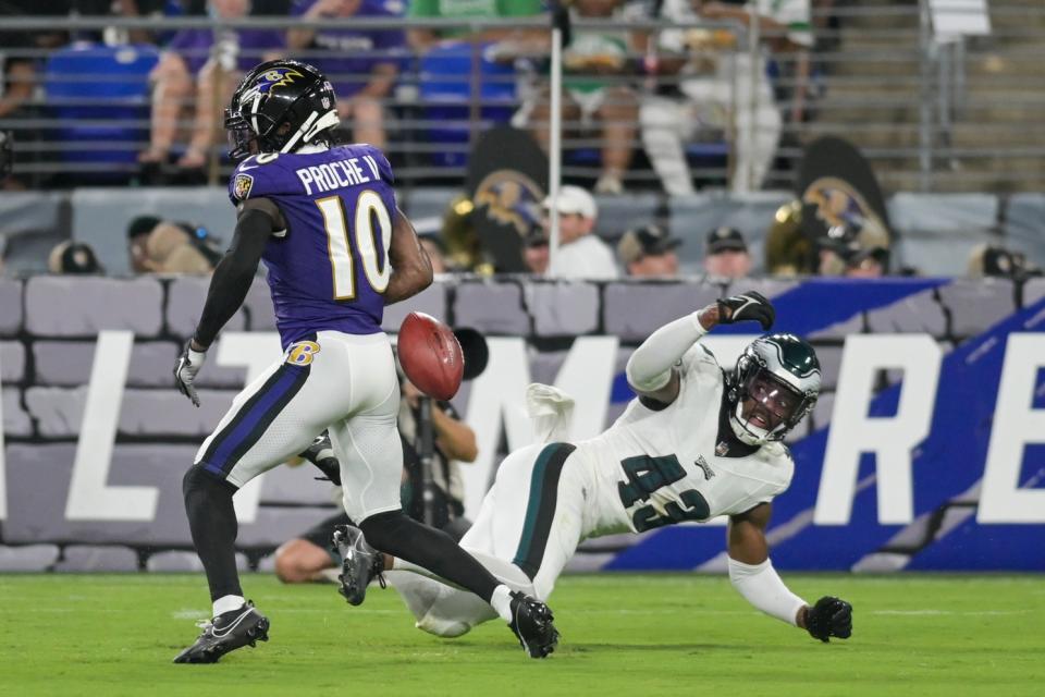 Aug 12, 2023; Baltimore, Maryland, USA; Philadelphia Eagles cornerback Mekhi Garner (43) strips the ball from Baltimore Ravens wide receiver James Proche II (10) on a punt return during the second half at M&T Bank Stadium. Mandatory Credit: Tommy Gilligan-USA TODAY Sports