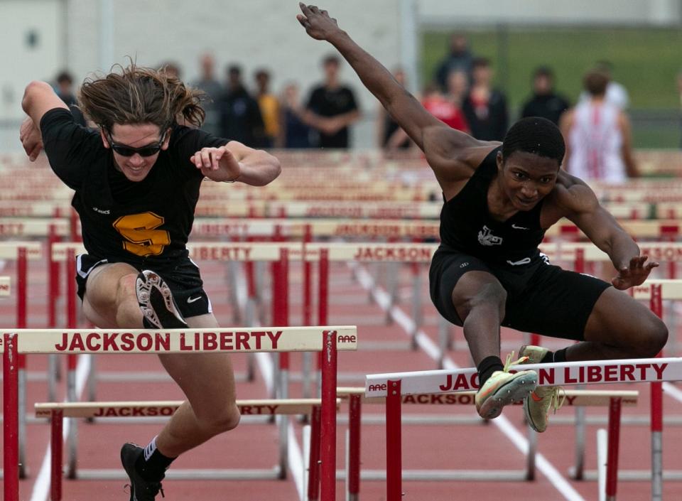 Menzel Thomas of Lakewood, right, wins the boys hurdles event. Southern Regionalâ€™s Gavin Lum takes second place. Ocean County Track Championships take place at Jackson Liberty High School. Jackson, NJSaturday, May14, 2022