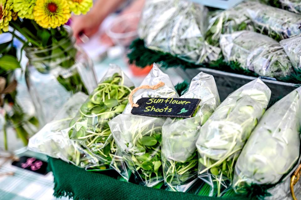 A selection of micro greens for sale at the Highwater Farms booth at the Allen Farmers Market on Wednesday, July 17, 2024, in Lansing.