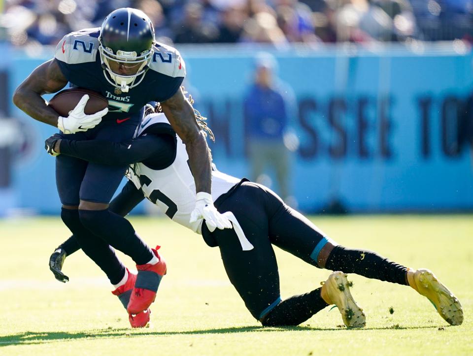 Titans wide receiver Julio Jones (2) is tackled by Jaguars cornerback Shaquill Griffin (26) during Sunday's first quarter.