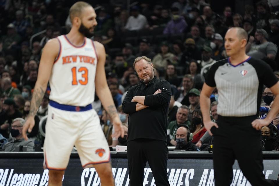 Milwaukee Bucks head coach Mike Budenholzer watches during the first half of an NBA basketball game against the New York Knicks Friday, Jan. 28, 2022, in Milwaukee. (AP Photo/Morry Gash)