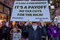 <p>Over a hundred protesters met at Greeley Square in Midtown Manhattan on Nov. 27, 2017 and marched along 34th Street behind a “Not One Penny of Tax Cuts for the Rich” banner, with “Tax Scam” signs, “Not One Penny” signs and giant checks made out from Medicaid or Medicare to billionaires or corporations, to raise awareness against the irresponsible tax plan that cuts Medicare and increases healthcare costs for older New Yorkers. (Photo: Erik Mcgregor/Pacific Press via ZUMA Wire) </p>