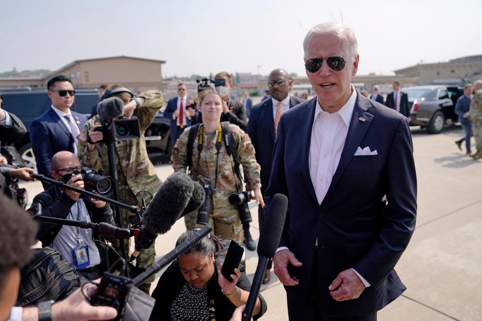 President Joe Biden speaks before boarding Air Force One for a trip to Japan at Osan Air Base, Sunday, May 22, 2022, in Pyeongtaek, South Korea.