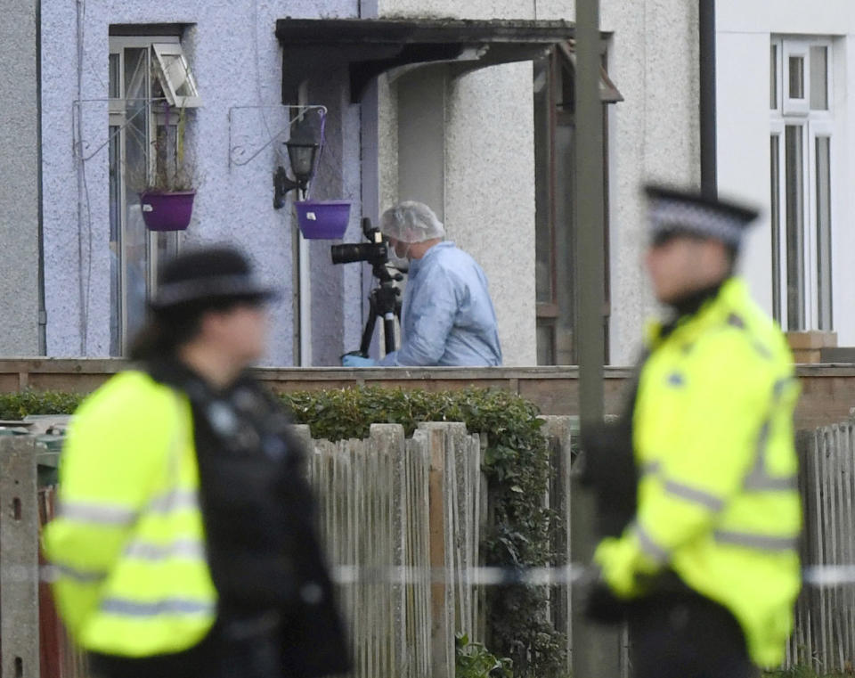 <p>Police and forensic officers work at a property in Sunbury-on-Thames, southwest London, as part of the investigation into Friday’s Parsons Green bombing, Saturday Sept, 16, 2017. British police made what they called a “significant” arrest Saturday in southern England following the partially exploded bomb attack on the London subway. (Photo: Victoria Jones/PA via AP) </p>