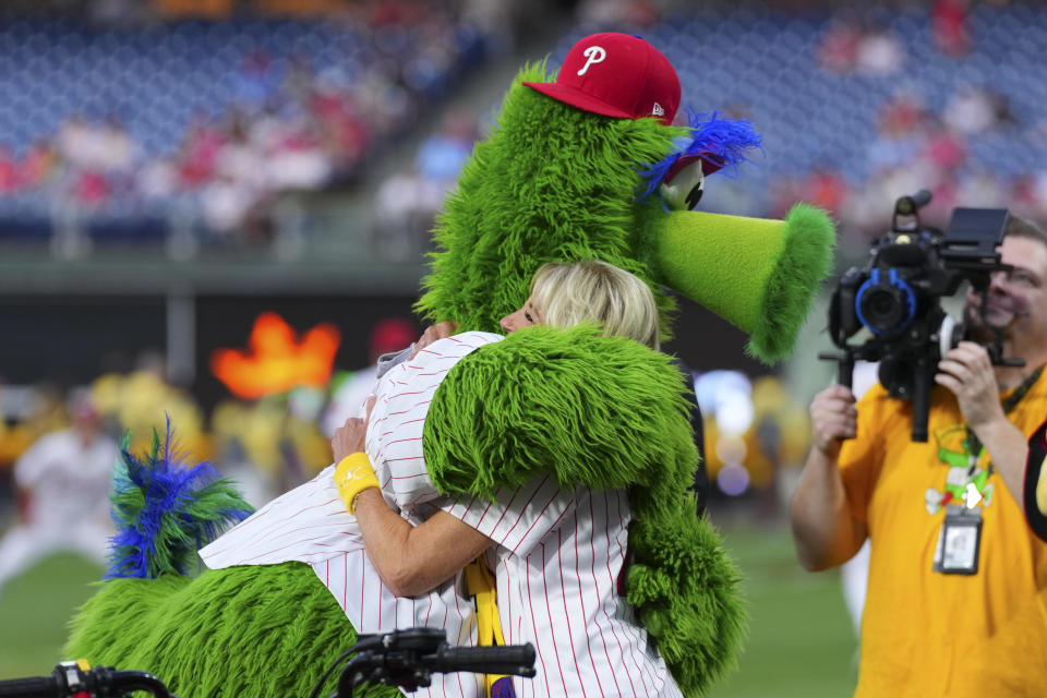 The Phillie Phanatic hugs first lady Jill Biden prior to the game between the Washington Nationals and Philadelphia Phillies at Citizens Bank Park on September 9, 2022 in Philadelphia, Pennsylvania. / Credit: Getty Images