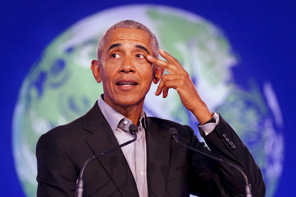 Former U.S. President Barack Obama gestures as he speaks during the COP26 U.N. Climate Summit in Glasgow, Scotland, Monday, Nov. 8, 2021. The U.N. climate summit in Glasgow is entering it’s second week as leaders from around the world, are gathering in Scotland's biggest city, to lay out their vision for addressing the common challenge of global warming. (Jane Barlow/PA via AP)