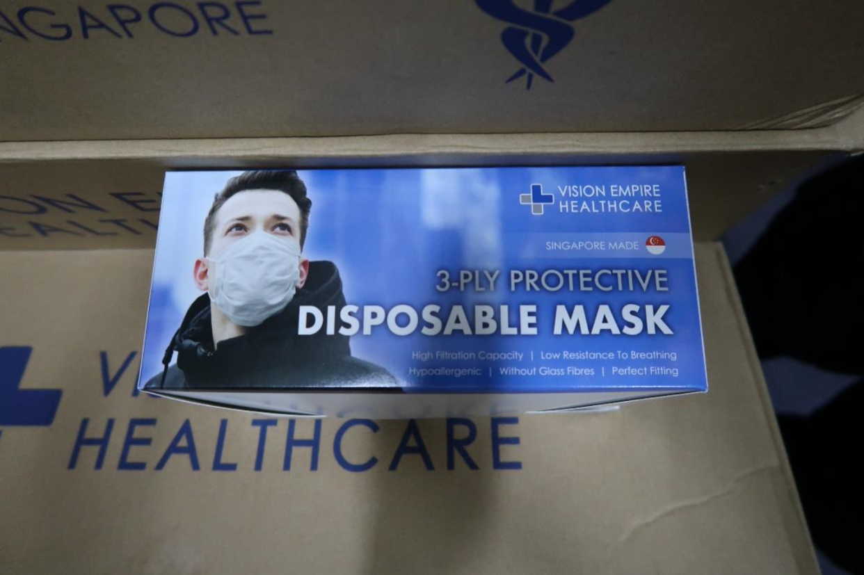 Face masks by Vision Empire International and branded under Vision Empire Healthcare were observed to be manufactured in an unhygienic and makeshift environment. The company is also suspected of importing surgical masks from overseas for repackaging and rebranding without a licence. (PHOTO: HSA)