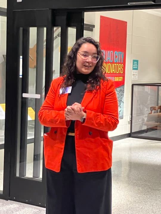 Kelly Lao, vice president of museum experience and education, talks about the new permanent exhibit before the ribbon-cutting Friday, April 26, 2024.