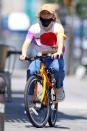 <p>Sienna Miller keeps a low profile while out for a bike ride on Tuesday in New York City. </p>