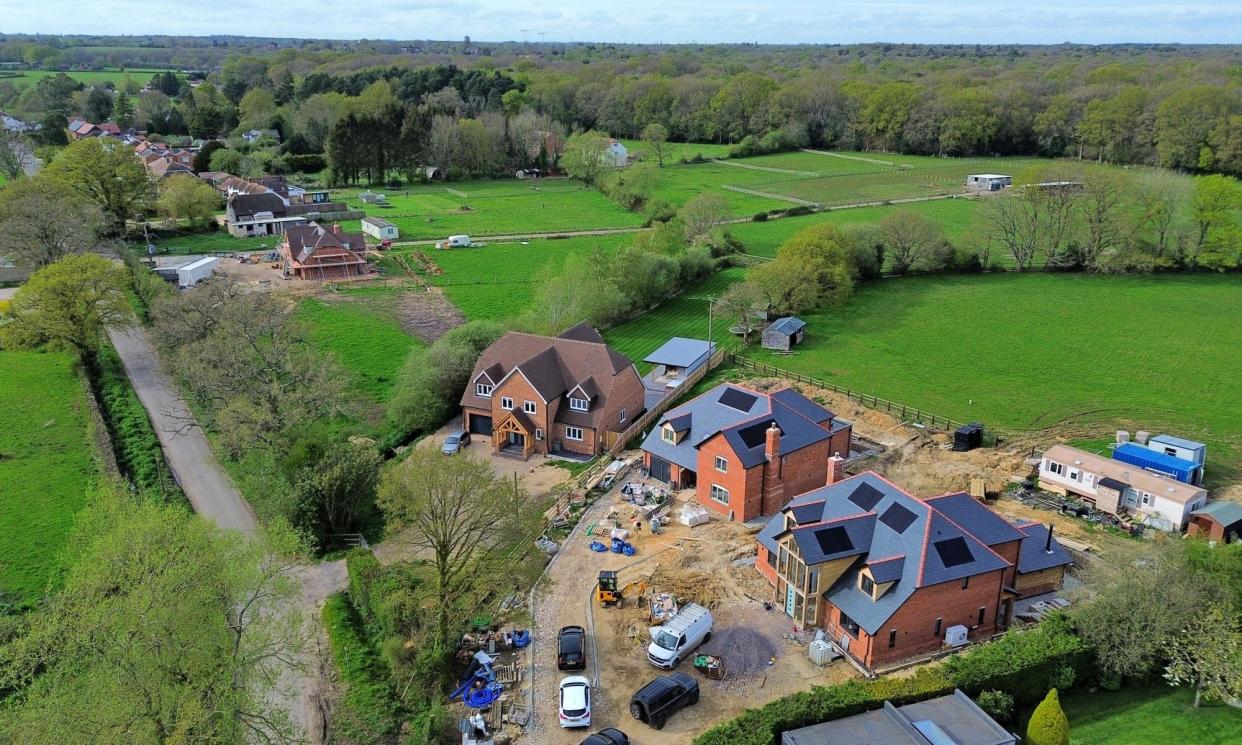 <span>New homes are being built in Little London, near Tadley, where there are few amenities apart from one pub.</span><span>Photograph: Simon Czapp/Solent News & Photo Agency</span>