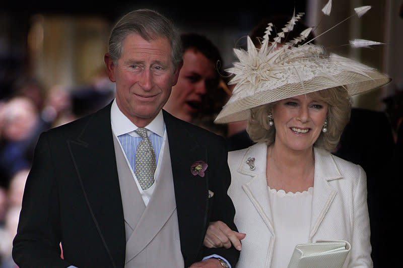 Prince Charles leaves Windsor's Guildhall following his marriage to Camilla Parker Bowles on April 9, 2005. File Photo by Hugo Philpott/UPI