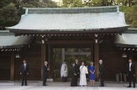 President Barack Obama tours Meiji Shrine in Tokyo, Thursday, April 24, 2014. Also on the tour with the president are chief priest Seitaro Nakajima, U.S. Ambassador to Japan Caroline Kennedy and her husband Edwin Schlossberg. Showing solidarity with Japan, Obama affirmed Thursday that the U.S. would be obligated to defend Tokyo in a confrontation with Beijing over a set of disputed islands, but urged all sides to resolve the long-running dispute peacefully. (AP Photo/Carolyn Kaster)