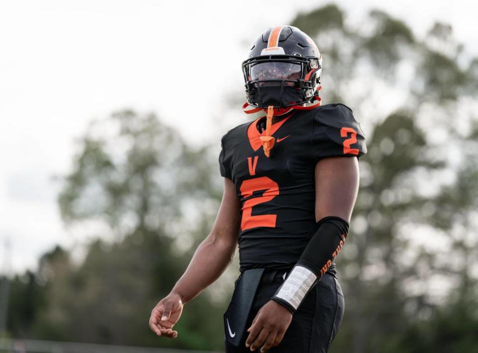 Vance Cougar Austin Grier runs through pre-game warmups. The Hough Huskies win the I-MECK 4A championship 29-22 vs the Vance Cougars Friday April 9, 2021.