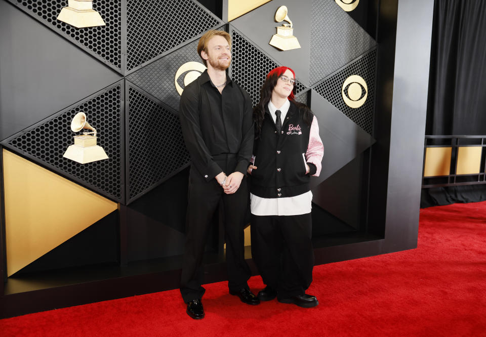 Finneas and Billie Eilish posed together on the carpet. Photo: Getty