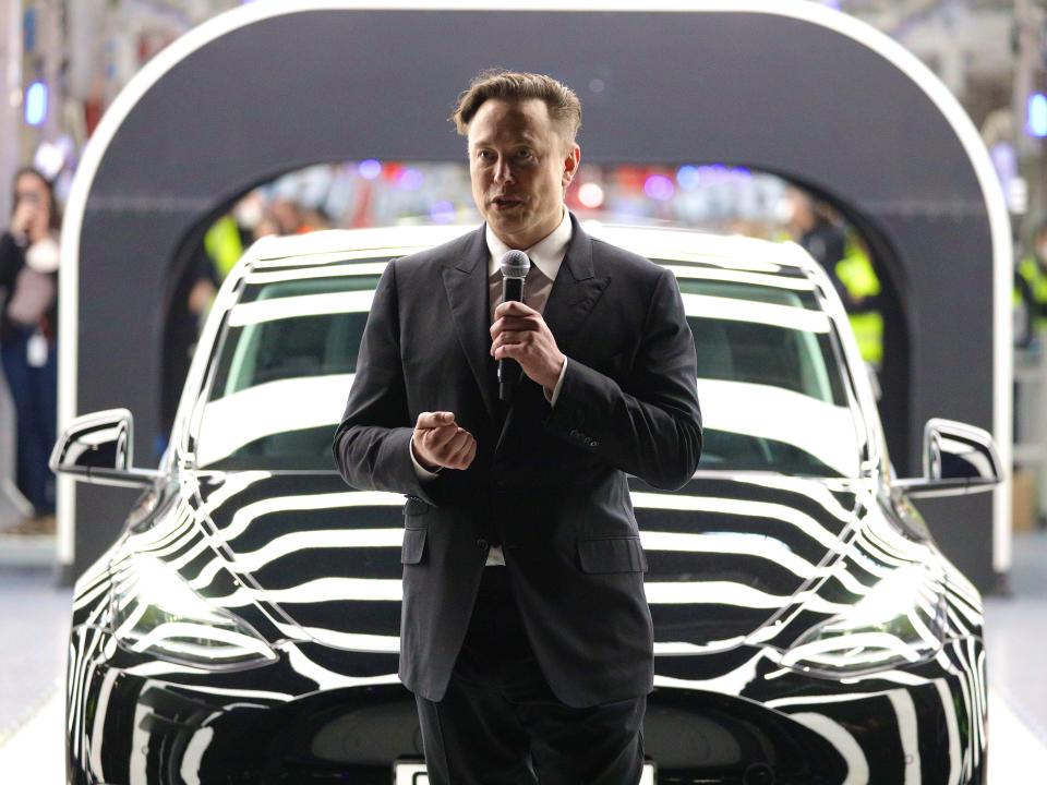 Elon Musk speaks at the opening of a new Tesla factory.