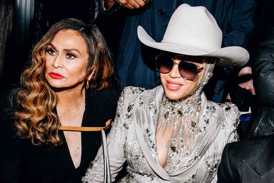 <p>Nina Westervelt/WWD via Getty</p> Tina Knowles and Beyoncé