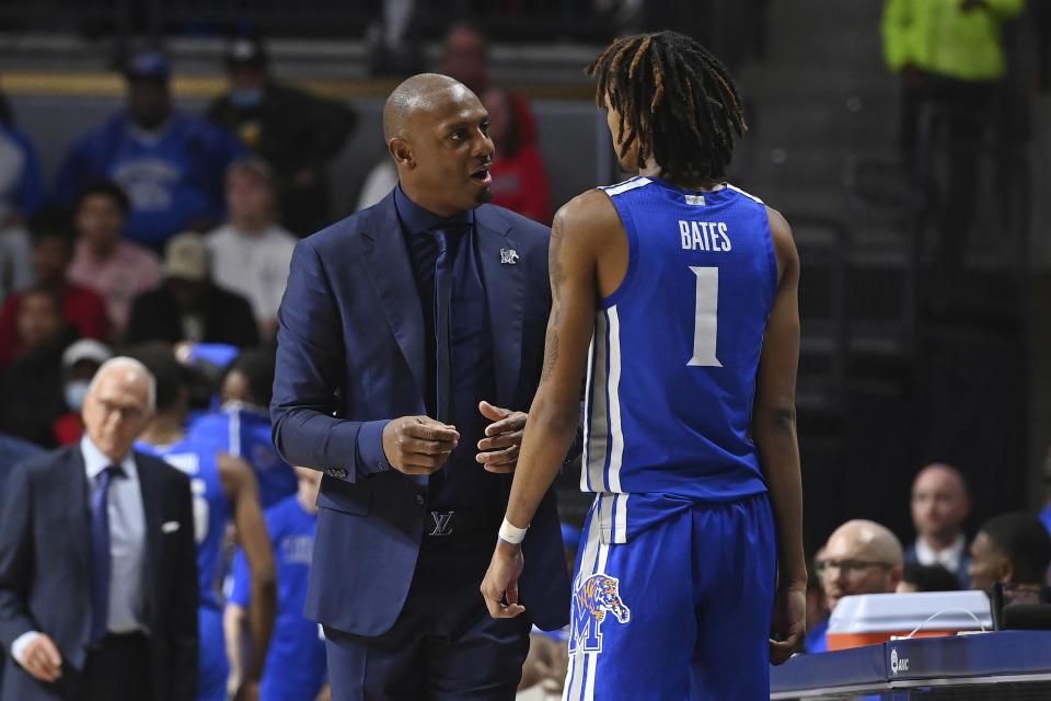 Memphis head coach Penny Hardaway talks to forward Emoni Bates (1) during the second half of an NCAA college basketball game against Mississippi in Oxford, Miss., Saturday, Dec. 4, 2021. Mississippi won 67-63. (AP Photo/Thomas Graning)
