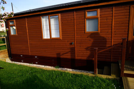 The sun shines on a mobile holiday cabin at Briar Hill in Newton Ferrers, Devon, Britain April 11, 2017. REUTERS/Dylan Martinez