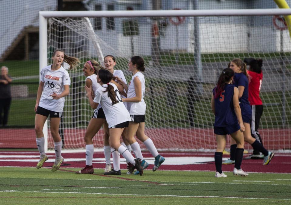 Croton-Harmon celebrates Lucia Thoreson's goal, which gave the Tigers the lead midway through the second half during the Section 1 Class B finals at Nyack High School.