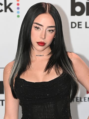 <p>Ivan Apfel/WireImage</p> Nicki Nicole attends the 2023 Billboard Latin Music Awards in October 2023 in Coral Gables, Florida