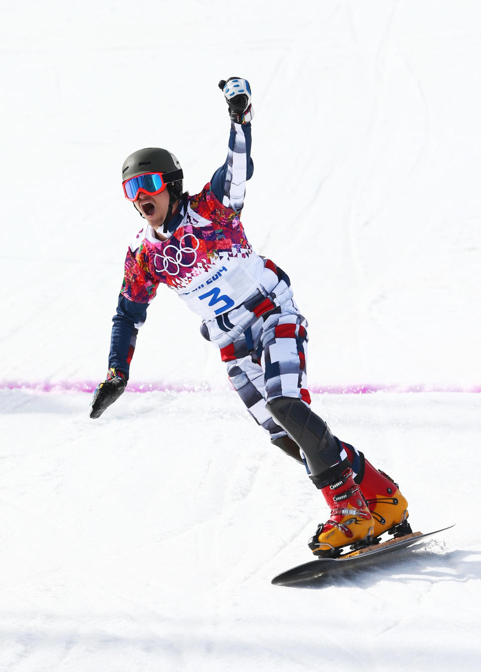 SOCHI, RUSSIA - FEBRUARY 22:  Vic Wild of Russia celebrates in the Snowboard Men's Parallel Slalom Semifinals on day 15 of the 2014 Winter Olympics at Rosa Khutor Extreme Park on February 22, 2014 in Sochi, Russia.  (Photo by Cameron Spencer/Getty Images)