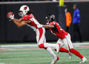 <p>Larry Fitzgerald #11 of the Arizona Cardinals pulls in this reception against Brian Poole #34 of the Atlanta Falcons at Mercedes-Benz Stadium on December 16, 2018 in Atlanta, Georgia. (Photo by Kevin C. Cox/Getty Images) </p>