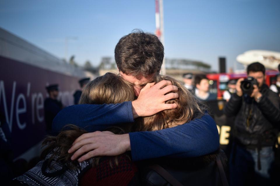 The youngsters hug during the protest (Getty Images)