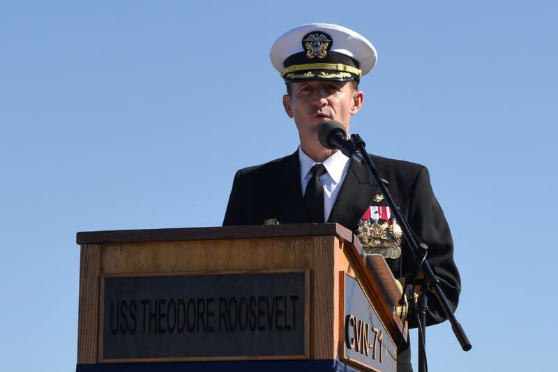 FILE PHOTO: Captain Brett Crozier addresses the crew for the first time as commanding officer of the aircraft carrier USS Theodore Roosevelt