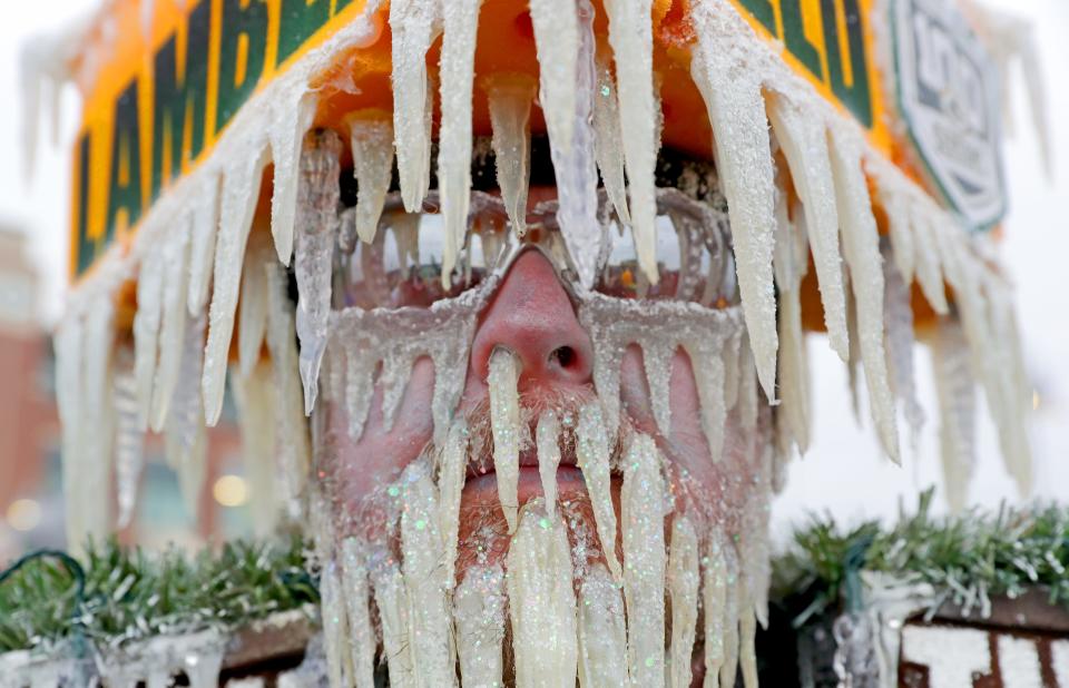 Jeff Kahlow, of Fon du Lac, dressed as Frozen Tundra Man hangs out in the lot before the Green Bay Packers game against the Miami Dolphins at Lambeau Field in Green Bay, Wis. on Sunday, November 11, 2018.