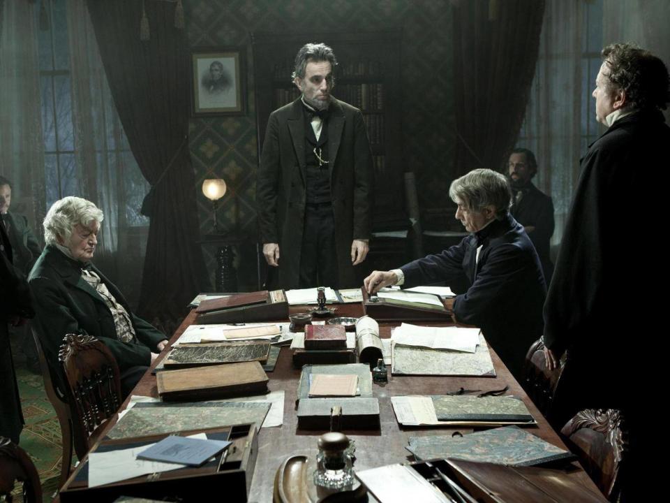 The actor (centre) won an Oscar for his role as the US President Abraham Lincoln in 'Lincoln' (Rex)