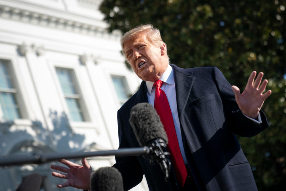 President Donald Trump speaks to reporters on the South Lawn of the White House before boarding Marine One.