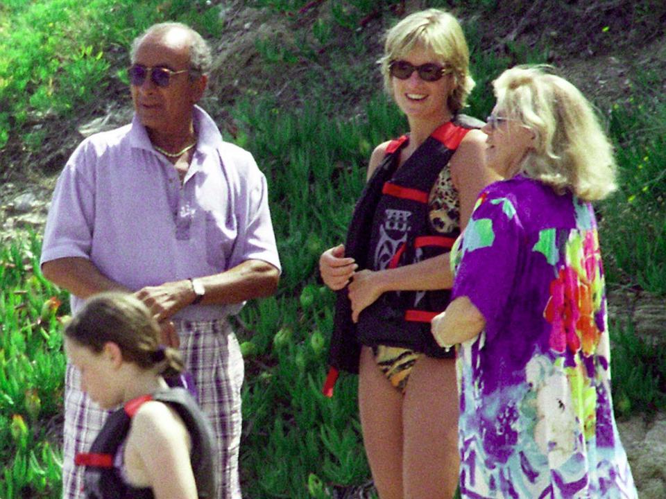 ST TROPEZ, FRANCE - JULY 17 1997: (FILE PHOTO) Mohammed Al Fayed (far left) and Diana, Princess Of Wales (C) are seen in St Tropez in the summer of 1997, shortly before Diana and Dodi were killed in a car crash in Paris on August 31, 1997. The inquests into both of their deaths are due to start in early 2004. (Photo by Michel Dufour/WireImage)