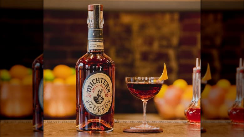 Michters bourbon bottle with cocktail